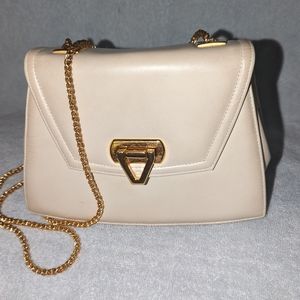 Theodor gold chain crossbody bag.
